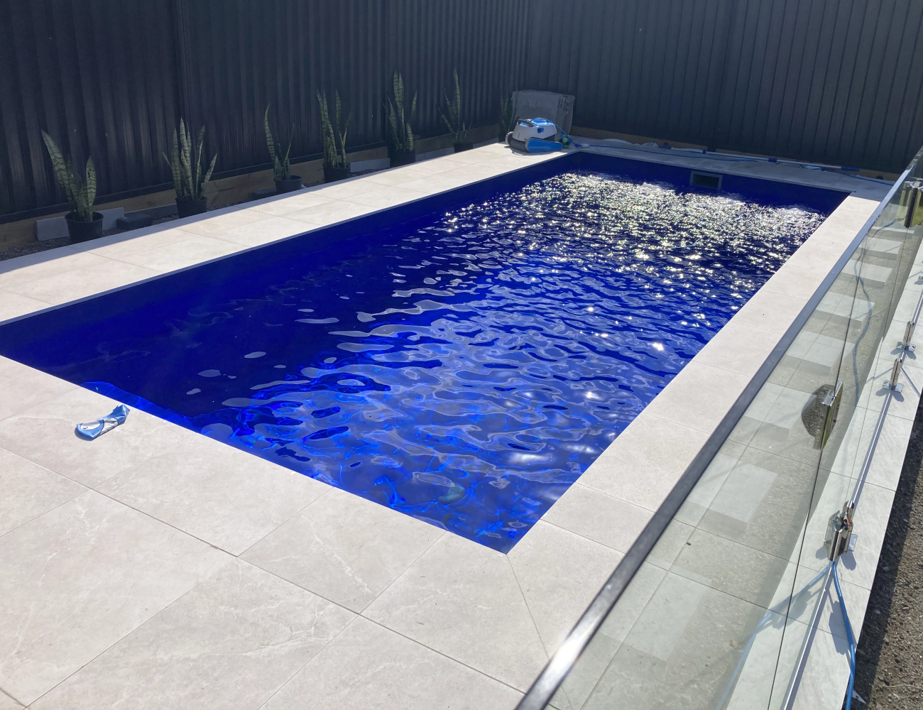 Saltwater fibreglass pool with clear, balanced water in NSW